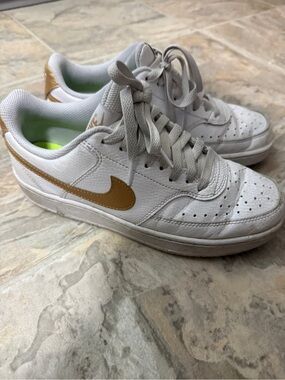 Nike White Sneakers with Gold Logo and Lime Insole